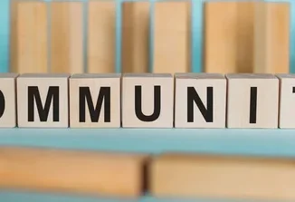 depositphotos_400316736-stock-photo-community-word-written-wood-block-1.webp